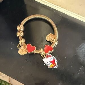Gold Bracelet with Red Heart Charms